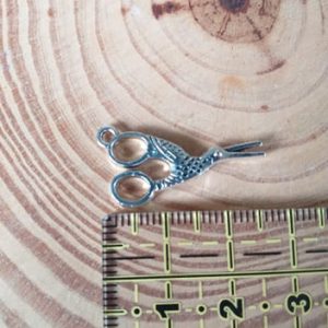 Pendentes em Metal Costura